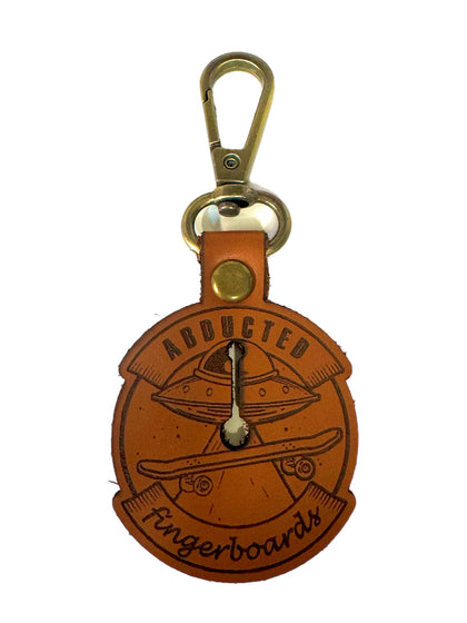 CFL.FB x ABDUCTED- Collab key chain- Tan